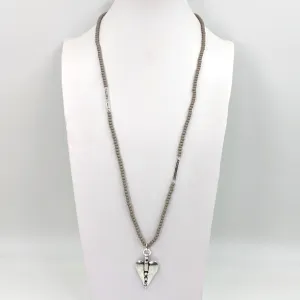 Heart pendant with crystal detail on beaded long necklace